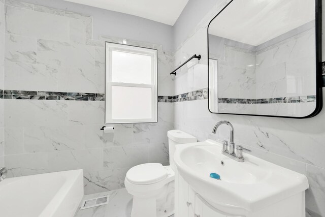 3435 W 71st Pl, Chicago, IL 60629 - full bathroom with marble finish floor, tile walls, toilet, vanity, and visible vents