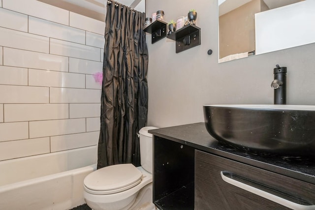 full bath featuring vanity, shower / bath combo, and toilet