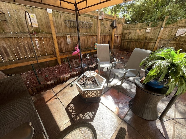view of patio / terrace with fence