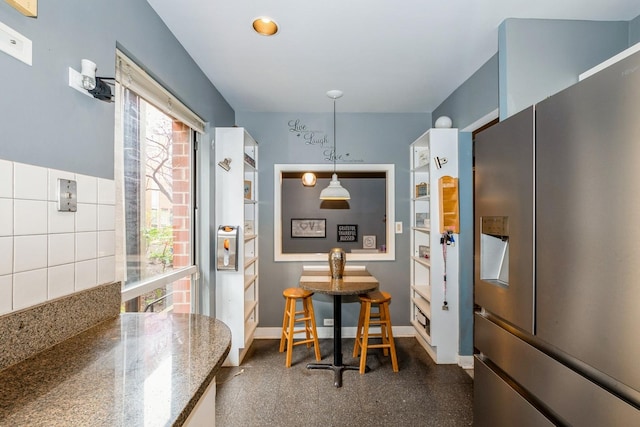 dining space with baseboards
