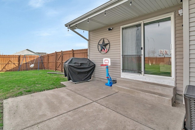 141 Scott Ave, Oglesby, IL 61348 - view of patio / terrace featuring grilling area, entry steps, and a fenced backyard