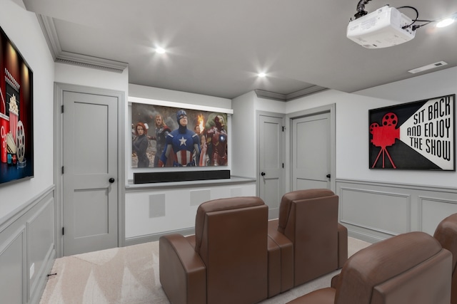home theater room with recessed lighting, a decorative wall, a wainscoted wall, and visible vents