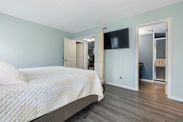 6443 Oak Forest Ave Unit 1W, Tinley Park, IL 60477 - bedroom featuring baseboards, wood finished floors, and visible vents