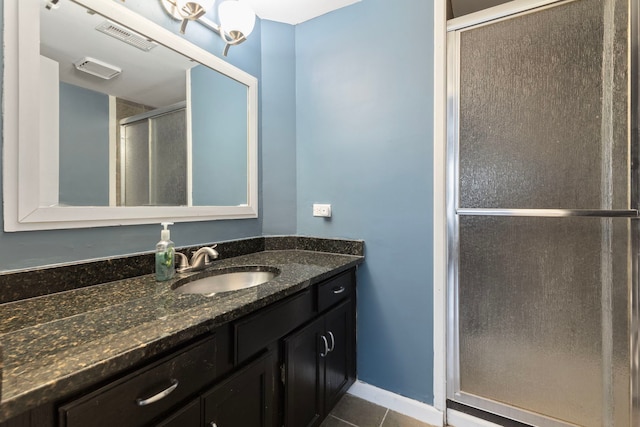 6443 Oak Forest Ave Unit 1W, Tinley Park, IL 60477 - full bath with tile patterned flooring, vanity, visible vents, and a stall shower