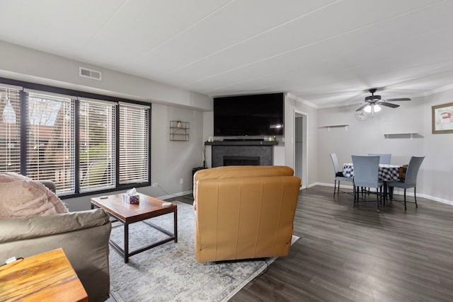 6443 Oak Forest Ave Unit 1W, Tinley Park, IL 60477 - living area featuring baseboards, a tiled fireplace, visible vents, and dark wood-style flooring