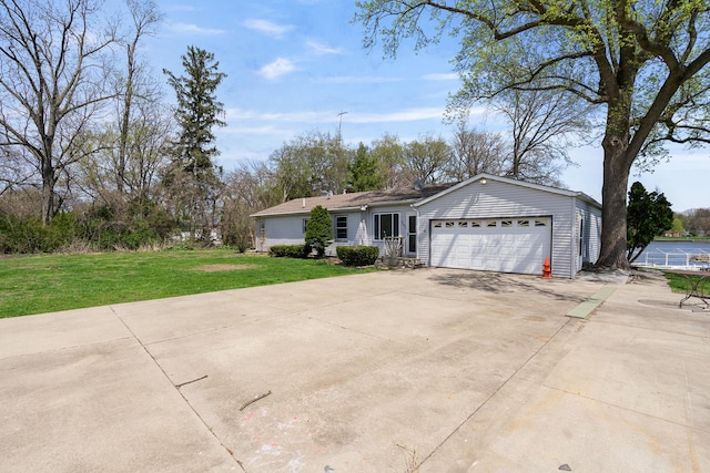 ranch-style house with an attached garage, a front yard, and concrete driveway