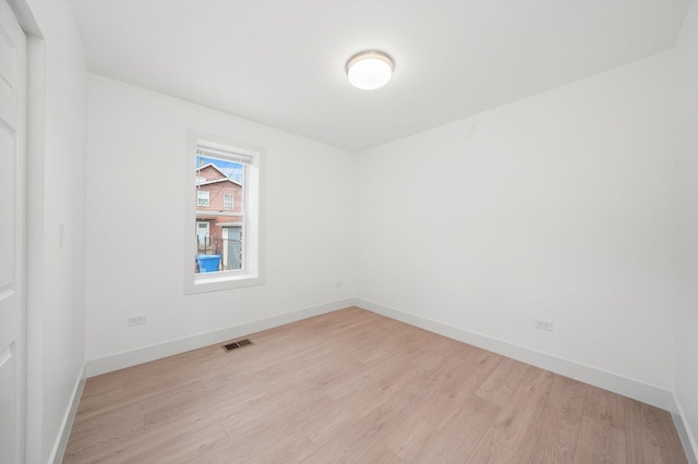 3246 S Normal Ave, Chicago, IL 60616 - empty room featuring light wood-type flooring and baseboards