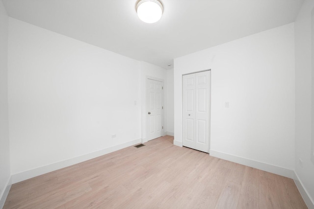 3246 S Normal Ave, Chicago, IL 60616 - empty room featuring light wood finished floors and baseboards