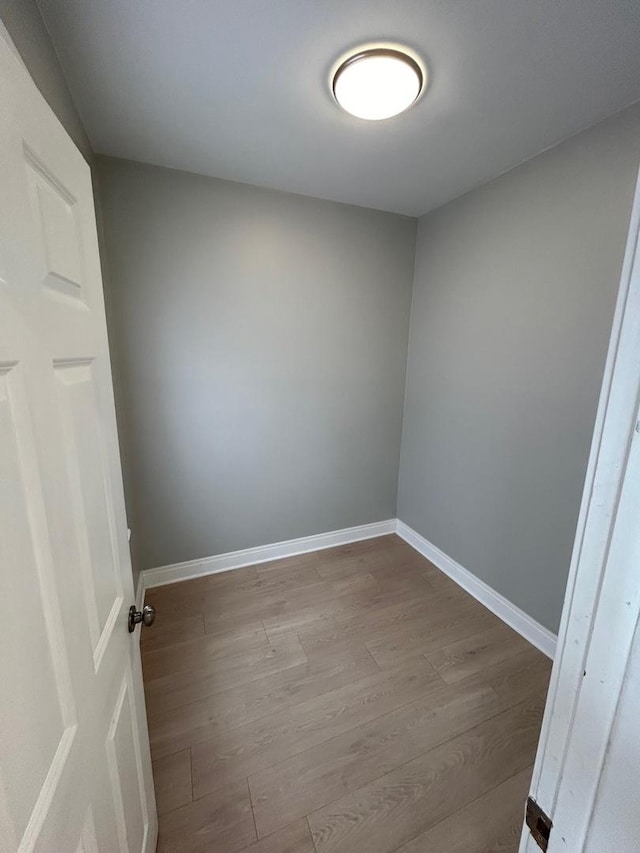 3246 S Normal Ave, Chicago, IL 60616 - empty room with wood finished floors and baseboards