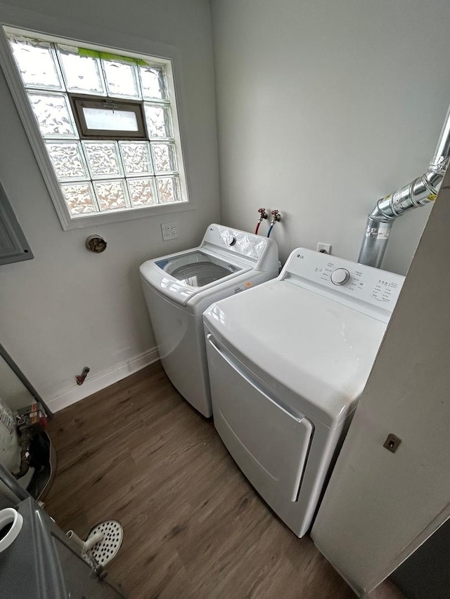 3246 S Normal Ave, Chicago, IL 60616 - laundry area featuring independent washer and dryer and wood finished floors