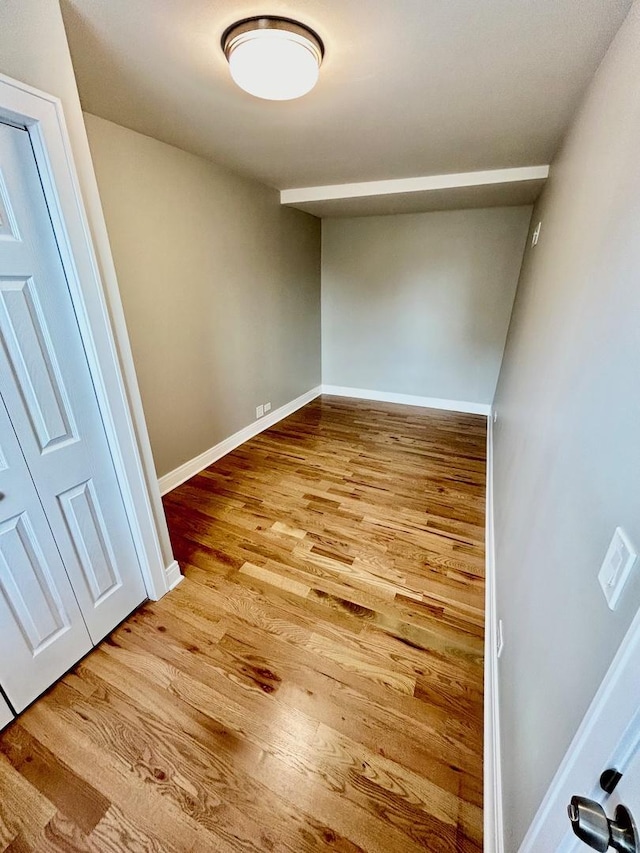 3246 S Normal Ave, Chicago, IL 60616 - unfurnished bedroom with wood finished floors and baseboards