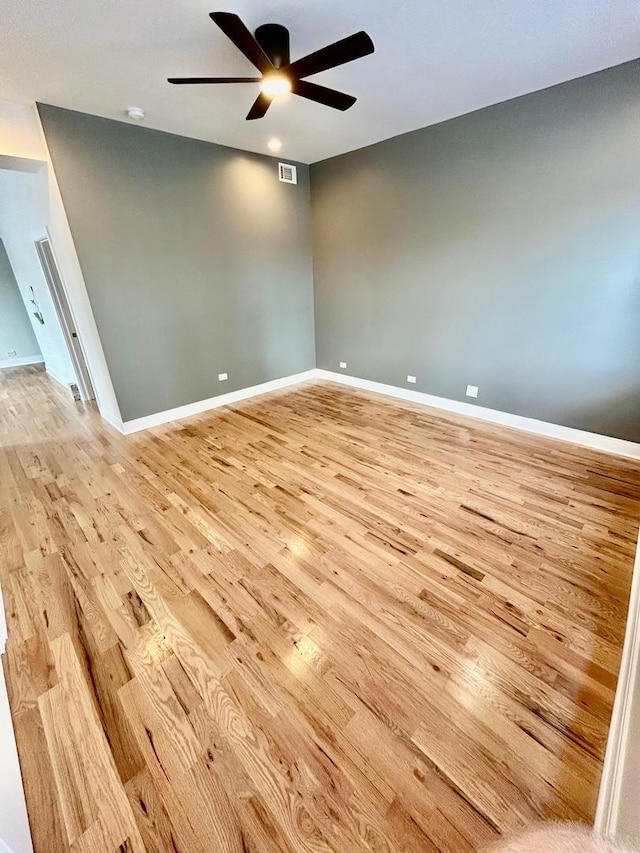 3246 S Normal Ave, Chicago, IL 60616 - empty room featuring light wood-style flooring and ceiling fan