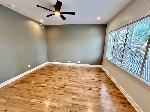 3246 S Normal Ave, Chicago, IL 60616 - unfurnished room with ceiling fan, light wood-type flooring, a smoke detector, and recessed lighting