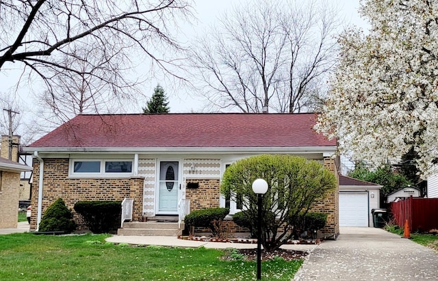 8212 N Ozanam Ave, Niles, IL 60714 - view of front of house featuring a front lawn, concrete driveway, fence, brick siding, and a garage