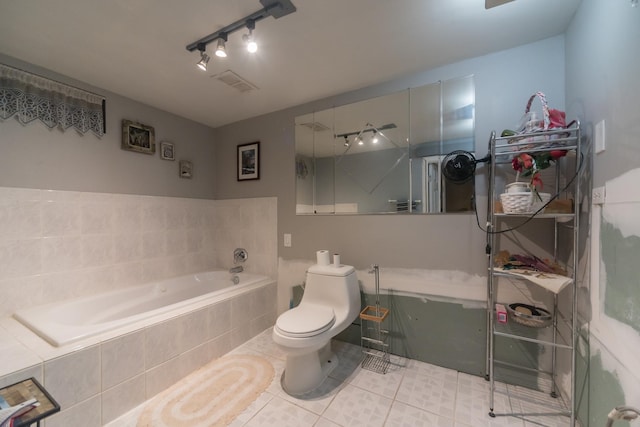 8212 N Ozanam Ave, Niles, IL 60714 - bathroom with toilet, visible vents, tile patterned flooring, a garden tub, and rail lighting