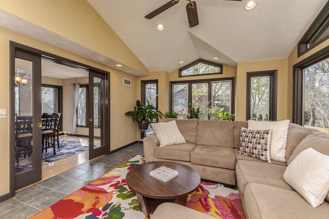 living area with ceiling fan, lofted ceiling, visible vents, and recessed lighting