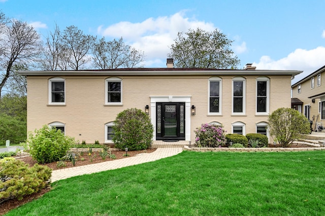 1214 Laurel Ct, Downers Grove, IL 60515 - bi-level home featuring brick siding, a chimney, and a front yard
