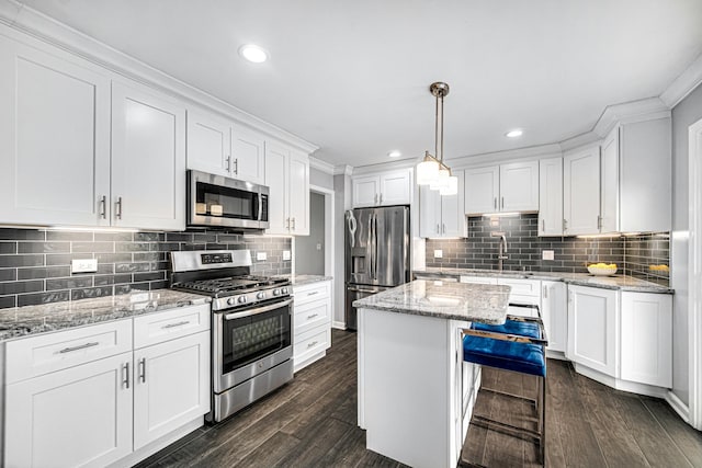 1214 Laurel Ct, Downers Grove, IL 60515 - kitchen with a sink, appliances with stainless steel finishes, tasteful backsplash, and white cabinetry