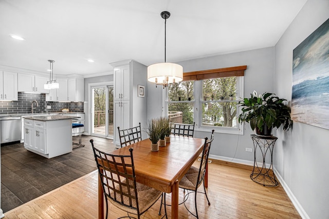 1214 Laurel Ct, Downers Grove, IL 60515 - dining room with baseboards, a wealth of natural light, and hardwood / wood-style flooring