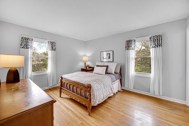 1214 Laurel Ct, Downers Grove, IL 60515 - bedroom with light wood-style floors and baseboards