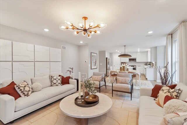 730 Cloverleaf Dr, Marengo, IL 60152 - living area with visible vents, recessed lighting, and a notable chandelier