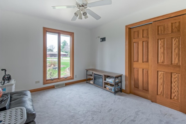 3515 Partridge Ln, Belvidere, IL 61008 - sitting room featuring ceiling fan, carpet floors, visible vents, and baseboards