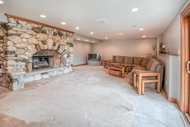 3515 Partridge Ln, Belvidere, IL 61008 - living room with unfinished concrete floors, a fireplace, baseboards, and recessed lighting