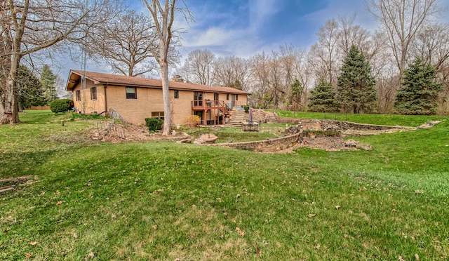 3515 Partridge Ln, Belvidere, IL 61008 - view of yard featuring stairway and a deck