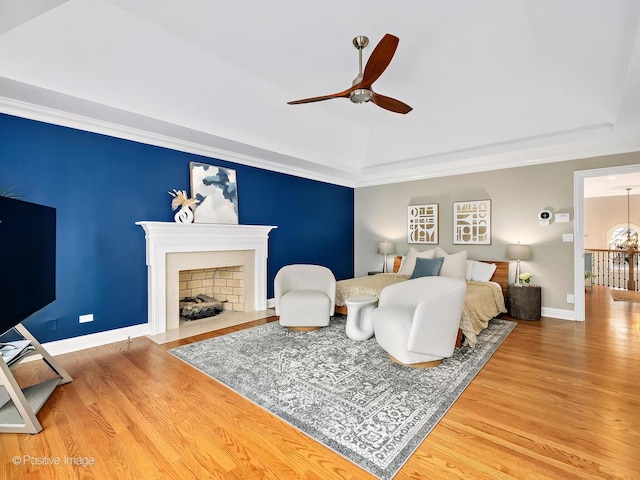 522 N Grant St, Hinsdale, IL 60521 - bedroom with a fireplace with flush hearth, baseboards, wood finished floors, and a raised ceiling