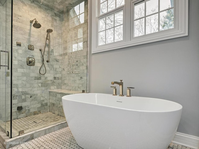 522 N Grant St, Hinsdale, IL 60521 - bathroom with baseboards, a freestanding tub, and a stall shower