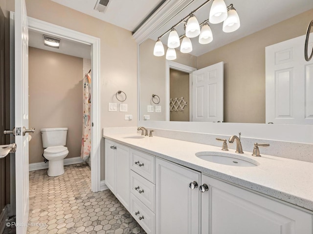 522 N Grant St, Hinsdale, IL 60521 - full bathroom featuring toilet, a sink, visible vents, and double vanity