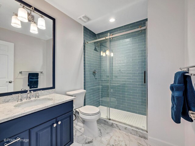 522 N Grant St, Hinsdale, IL 60521 - bathroom with a shower stall, marble finish floor, vanity, and visible vents