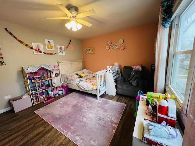 bedroom featuring wood finished floors and ceiling fan