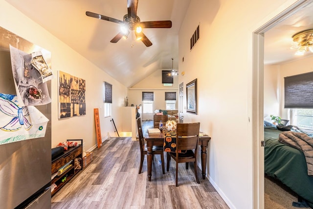 dining space featuring ceiling fan, baseboards, wood finished floors, and visible vents