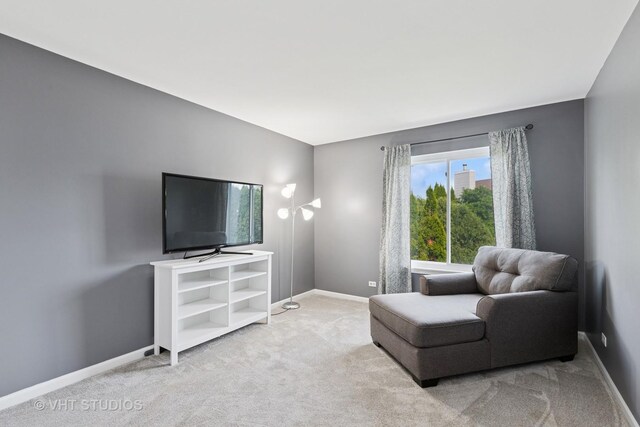 1635 Arlington Ln, Gurnee, IL 60031 - sitting room with baseboards and light carpet