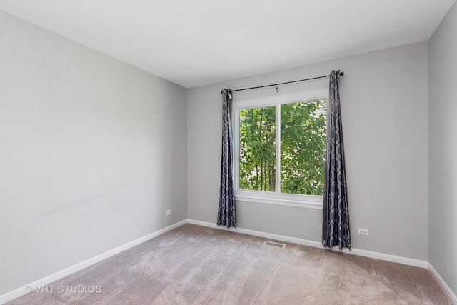 1635 Arlington Ln, Gurnee, IL 60031 - carpeted empty room featuring baseboards
