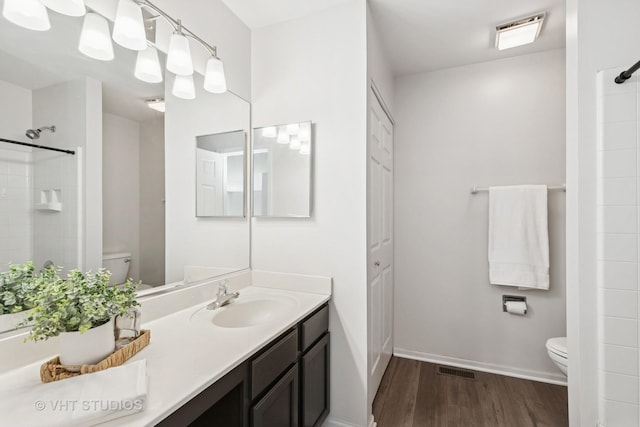 1635 Arlington Ln, Gurnee, IL 60031 - full bath with wood finished floors, vanity, and a shower