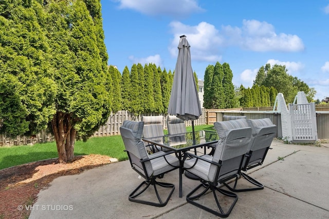 1635 Arlington Ln, Gurnee, IL 60031 - fenced backyard featuring a patio area and outdoor dining space