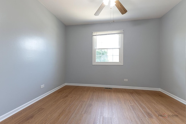 1680 Bicek Dr, Hoffman Estates, IL 60192 - unfurnished room with wood finished floors and ceiling fan