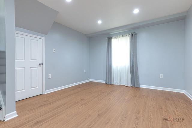 1680 Bicek Dr, Hoffman Estates, IL 60192 - unfurnished room featuring light wood-type flooring, recessed lighting, and vaulted ceiling