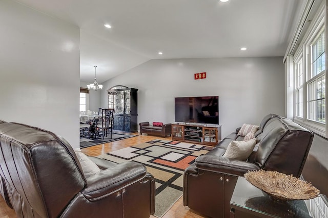 1680 Bicek Dr, Hoffman Estates, IL 60192 - living room featuring lofted ceiling, a chandelier, light wood-style flooring, and recessed lighting