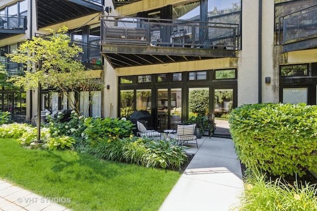 doorway to property with a balcony