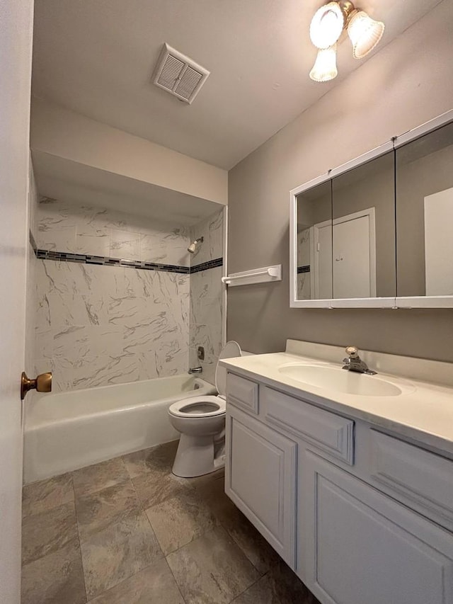 full bathroom featuring shower / washtub combination, visible vents, vanity, and toilet