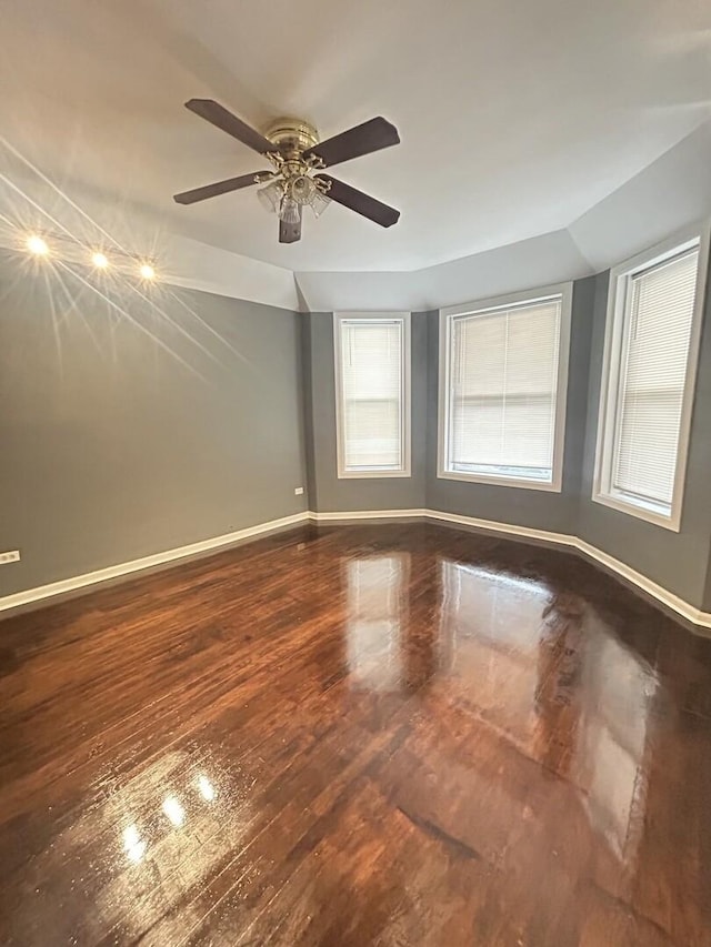 7038 S Vernon Ave, Chicago, IL 60637 - spare room with wood finished floors, baseboards, and a ceiling fan