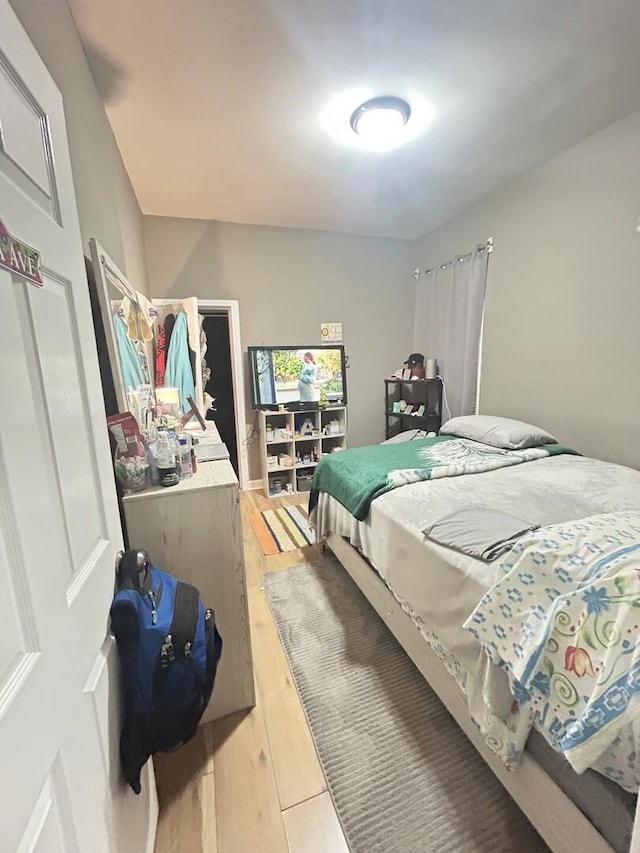 7038 S Vernon Ave, Chicago, IL 60637 - bedroom featuring light wood-style flooring