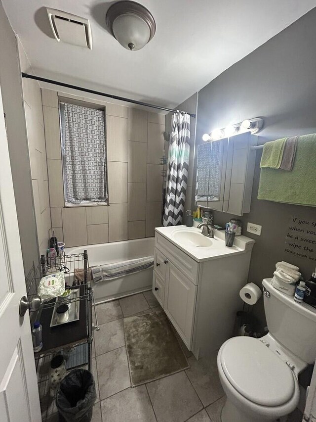 7038 S Vernon Ave, Chicago, IL 60637 - bathroom featuring toilet, tile patterned flooring, vanity, and shower / bath combination with curtain