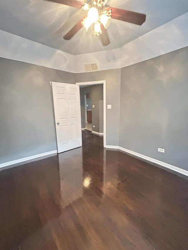 7038 S Vernon Ave, Chicago, IL 60637 - empty room with ceiling fan, baseboards, and wood finished floors