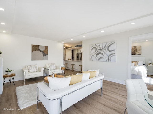 1310 N Ritchie Ct Unit 27B, Chicago, IL 60610 - living room with wood finished floors, recessed lighting, and baseboards