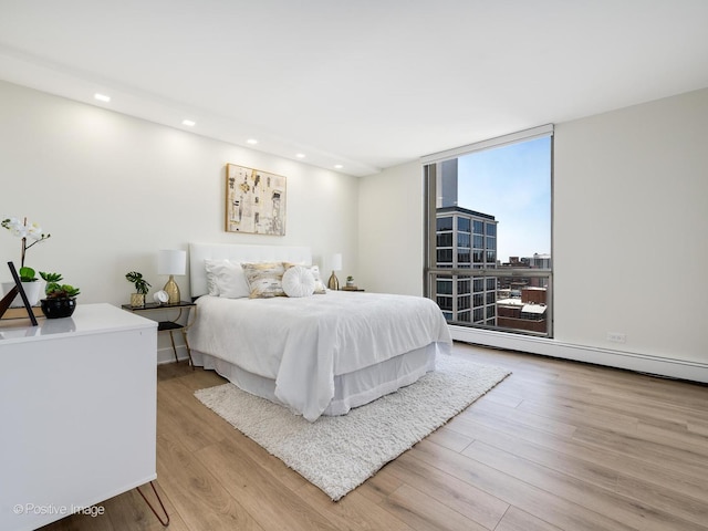 1310 N Ritchie Ct Unit 27B, Chicago, IL 60610 - bedroom with wood finished floors and recessed lighting