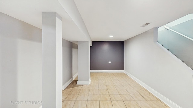 finished below grade area featuring recessed lighting and baseboards